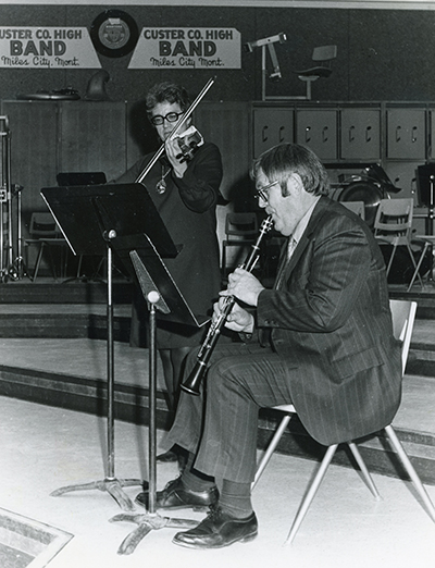 Ralph and Norma practice on clarinet and violin.