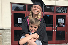 Libby Steigers with her son on graduation day