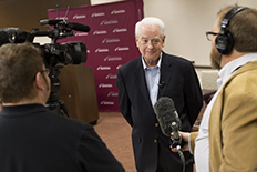 Media interviews at a press conference.